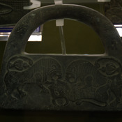 Jiroft, Weight with a decoration of two lions and a dead bull