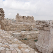 Amman, Citadel, Umayyad Palace, colonnaded street with remains of a pedestal with garland