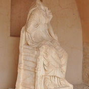 Gadara, West theater, Headless statue of an enthroned goddess, problaby Tyche, wearing a cornucopia
