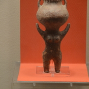 Bab edh-Dhra, Nude female pottery figurine, holding a jar on her head