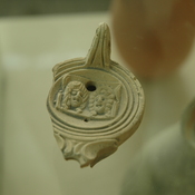 Lepcis Magna, Oil lamp with two theater masks