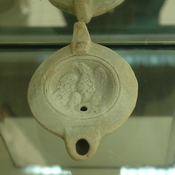 Lepcis Magna, Oil lamp with an eagle