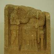 Ptolemais, Relief of a woman and her servant
