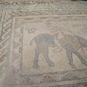 Mosaic depicting man on mule