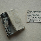 Leaden figurine in a leaden box, probably used for magic purposes
