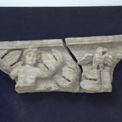 Relief of a military eagle and a genius