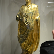 Emona, Gold statue of a togatus