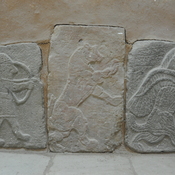 Tell Halaf, West palace south wall, orthostats with a griffin, soldier and a cherubs