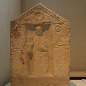 Carthage, Tombstone with votive relief of a male, raising a hand