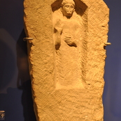 Carthage, Tombstone with votive relief of a male, raising a hand