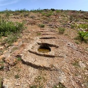 Rock cut steps to the summit. (South west slope)