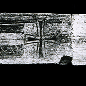 Black and white photograph of the Byzantine lintel found embedded under the Abbasid Period derage.