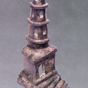 Bronze lamp shaped like a lighthouse, perhaps a miniature replica of Caligula lighthouse, found in Libarna.