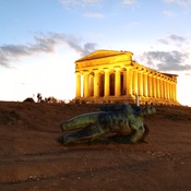 Temple of Concordia, and the modern statue of Icarus, at sunset.