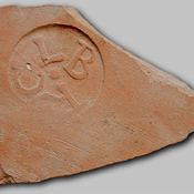 Tile with round stamp  